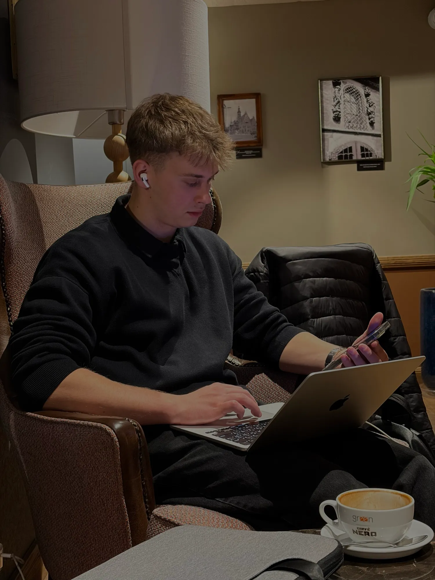 Me working on a laptop in a café